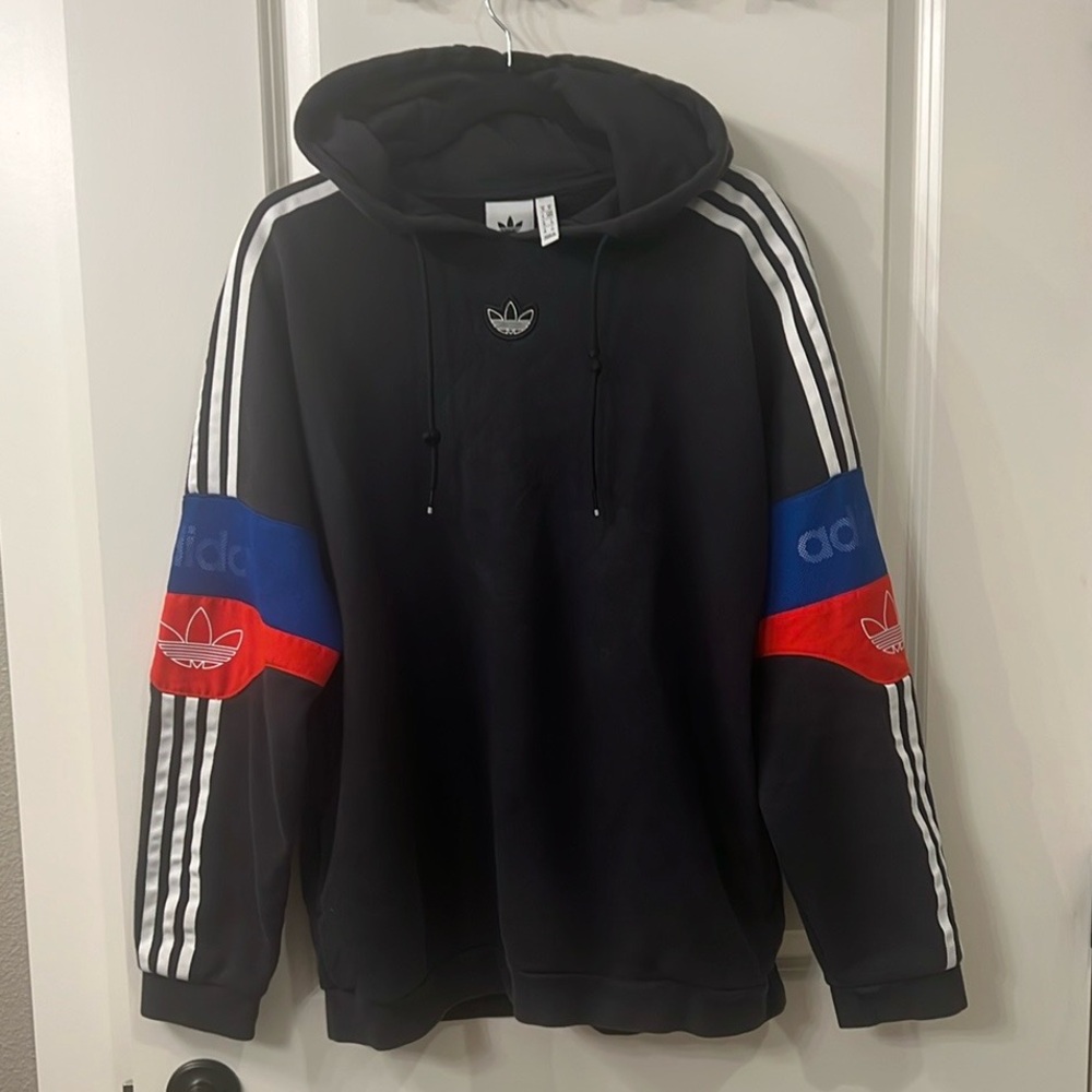 Adidas Trefoil Hoodie Sweatshirt 
Men's Black Hoodie with Blue and Red Accents